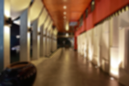blur image of corridor or building hallway at night for backgroundの写真素材