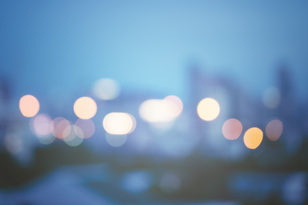 Abstract urban night light bokeh, defocused backgroundの写真素材