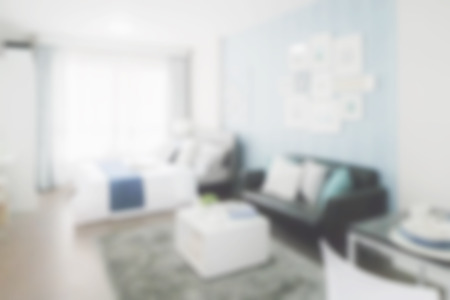 Blurred background bedroom with sofa in blue color scheme decorationの写真素材