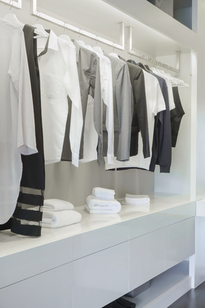 Modern style men's wardrobe at homeの写真素材