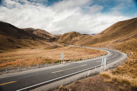 New Zealand south island a road going through between mountains, photo taken from view point on the sideの写真素材