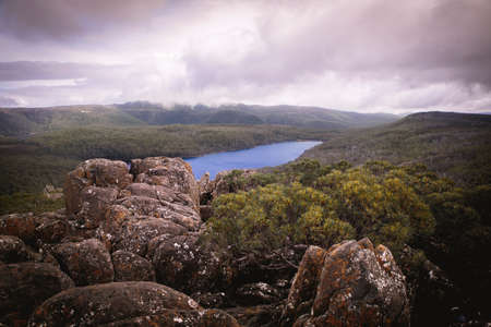 Viewpoint on a lake in Tasmania, really rocky track on the way to the topの写真素材