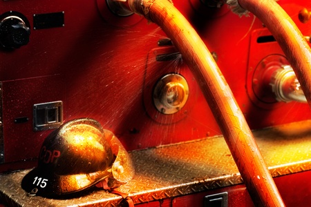 Fire trucks work during a fire.の写真素材