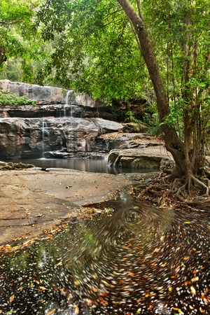 Waterfall in Thai national park. The  rare water in summer . But it can show the beauty of the  moveing of waterの写真素材