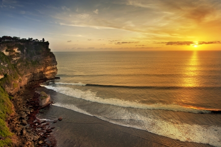 Sunset from the Pura Uluwatu temple on Bali island in Indonesiaの写真素材