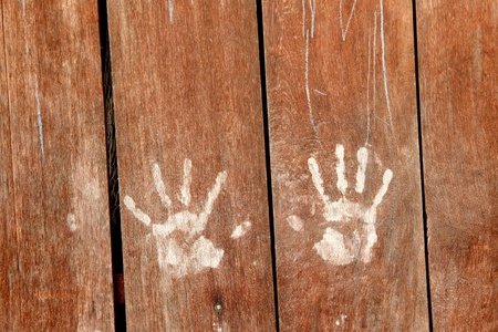 blown wood wall with white hand printの写真素材