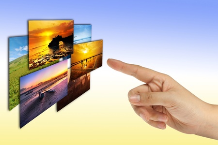 woman hand select photos in colour background の写真素材
