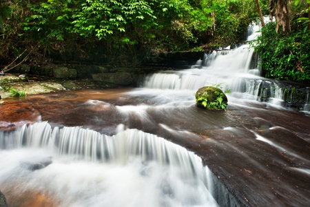 waterfall in thai national park. In the deep forest on mountain.の写真素材