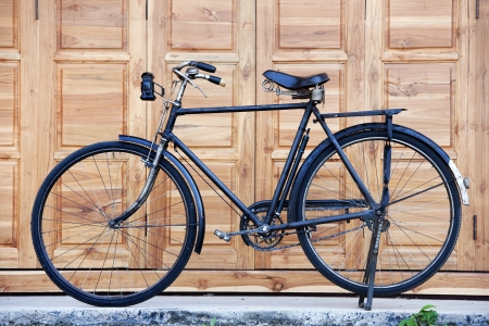 Old black classic bicycleの写真素材
