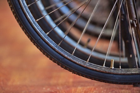 Old many black bicycle wheel の写真素材