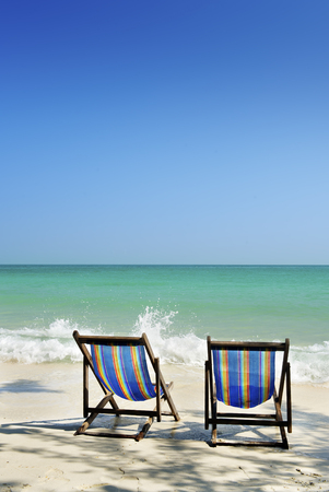 chair in sea sand sunの写真素材