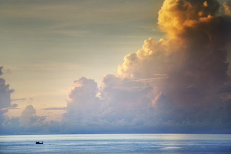 fisherman on boat in morning ,thailandの写真素材