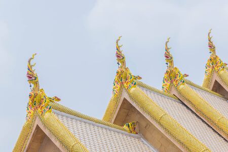 The sanctuary, temple, symbol of Phaya Naga, the roof.The public property at Wat Pahyai Wat Maha Wanaram, Temple, Ubon Ratchathani, province, Thailand.の写真素材