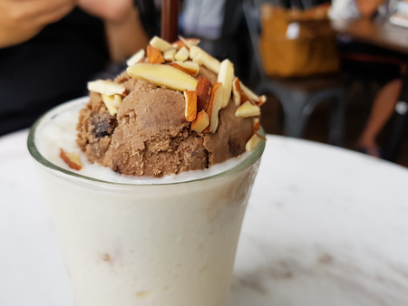 Original Vanilla Milkshake With Mocca Ice Cream and Almond  Nuts on Top, Select Focusの写真素材