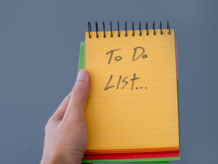 Hand holding To do list concept
