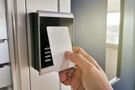 Hand using Key card;access control conceptの写真素材
