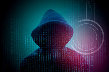 Hacker with binary code background ;data security conceptの写真素材