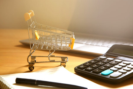 Shopping cart and calculator; Budget and financial management conceptの写真素材