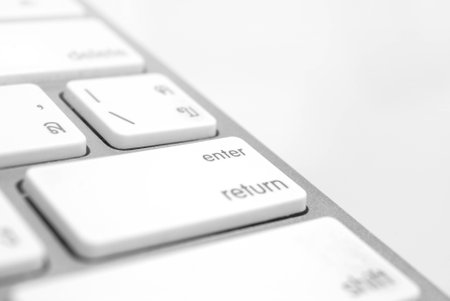 Enter button close up an soft focus keyboard computer with gray colorの写真素材