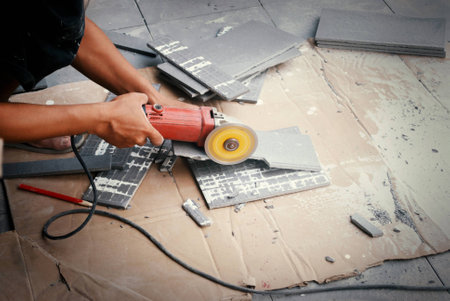 hand cut floor tile installation Filtered image processed vintage effectの写真素材