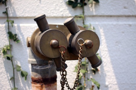 Double heads fire Hydrant in the wallの写真素材