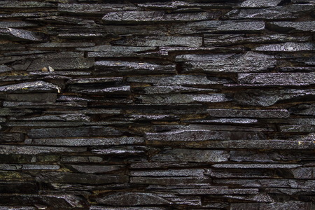 pattern of decorative slate stone wall surfaceの写真素材