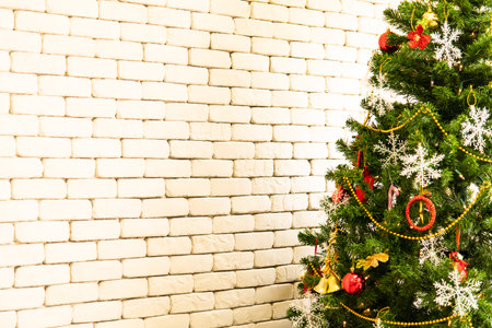 Christmas background with Christmas toys on the Xmas tree and giftの写真素材