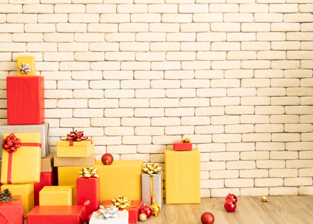 Christmas background with Christmas toys on the Xmas tree and giftの写真素材
