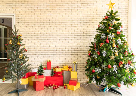 Christmas background with Christmas toys on the Xmas tree and giftの写真素材