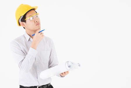 Asian male construction engineer follow up construction progressの写真素材