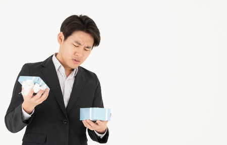 Asian businessman and emotionsの写真素材