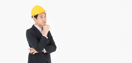 Asian male construction engineer follow up construction progressの写真素材