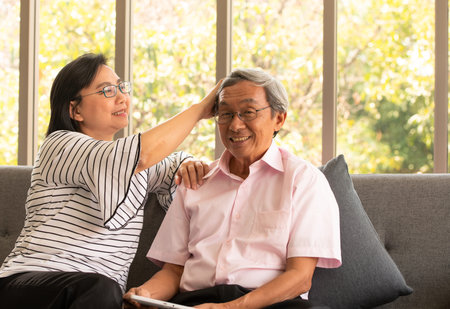 Senior couples relax on holiday with modern technologe
