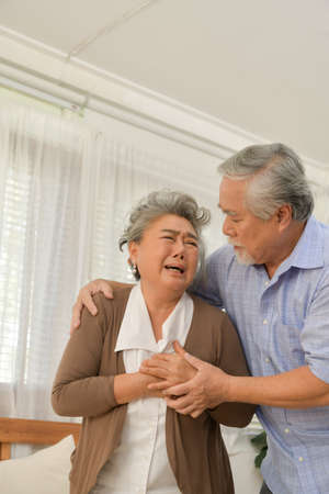 Senior couple that need to look after each other without children and grandchildren to attention.の写真素材