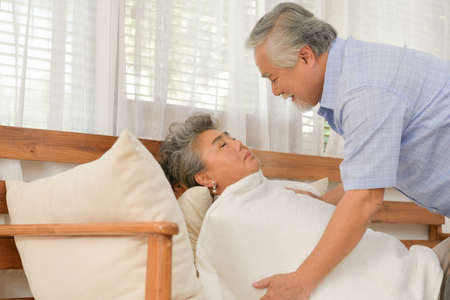 Senior couple that need to look after each other without children and grandchildren to attention.の写真素材