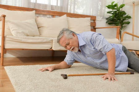 An elderly man who has to look after himself without children and grandchildren to attention.の写真素材