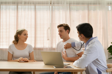 Love couple having infertility problems need advisor with the doctor.の写真素材