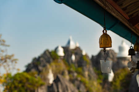 Wat chaloem phrachomklao rachanuson that the tample and pagoda on rock mountain in sunshine beautiful. Architecture landmark Lampang,Thailandの写真素材