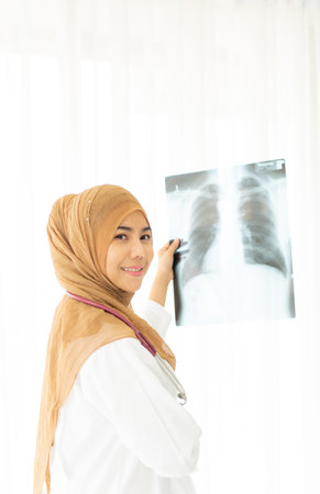 Closeup portrait of Muslim doctors sit and work in the doctor's room. Think and analyze the results...