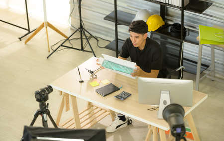 Professional digital video cameras filming male vlog for online sales and filming new products online for customers select.の写真素材