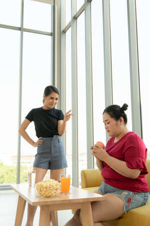 Images of young women, trainers and students in weight loss classes and diet control classes for overweight people.の写真素材