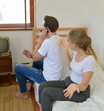 Couples who spend their time at home and make the surprise for each other.の写真素材