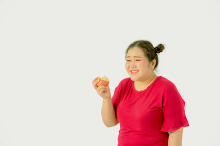 Asian obese women are overweight. With various emotions for herself, eating and exerciseの写真素材