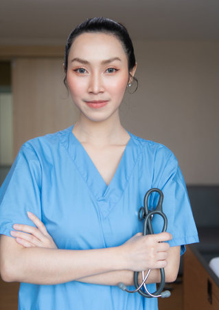 A doctor with a stethoscope used for initial diagnosis working at a hospital