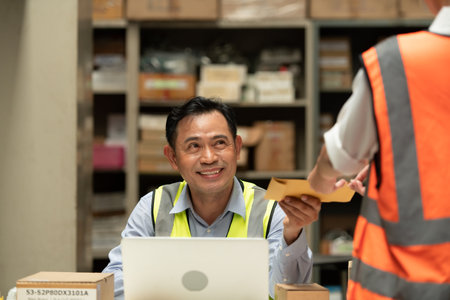 The warehouse manager gave the female assistant a premium. who assisted in the work and planning of...
