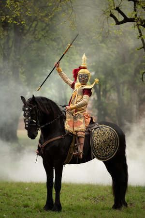 Khon is a classic Thai dance in a mask in Ramayana literature, and this is another character, His nam is Wirun Chambang and a horse named Nilphahu.の写真素材
