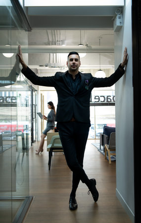 Businessman in the corridor in the conference room Relax with various posture before presenting work and new projects to the management team for consideration in the meeting roomの写真素材