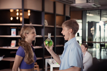 Portrait of students in science classroom play with each other and have fun before attend class.の写真素材