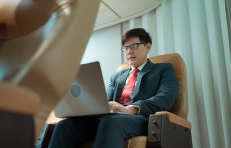 Business people are required to travel frequently for international business. Use the business class service to travel by plane because there are facilities to contact business and convenienceの写真素材