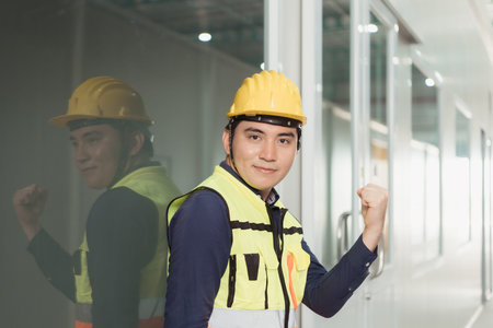 The warehouse supervisor is overjoyed that the project has been approved by management.の写真素材